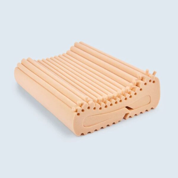 Therapeutic sleeprrr pillow showing memory foam inserts which can be removed to adjust comfort level.